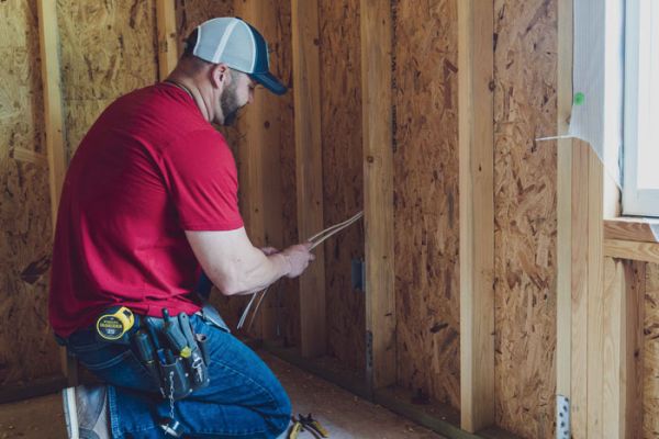 Meks Electrician making a residential service call